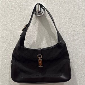 Gucci Black Leather Handbag with Gold Accents
